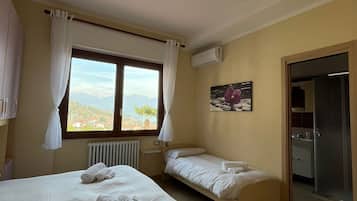 Triple Room, Lake View | Iron/ironing board, free WiFi