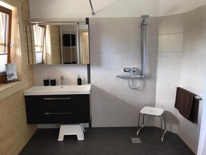 Shower, hair dryer, bathrobes, towels