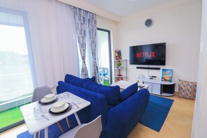 Deluxe maisonnette, uitzicht op park | Dineren in de kamer