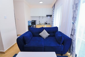 Deluxe maisonnette, uitzicht op park | Woonruimte