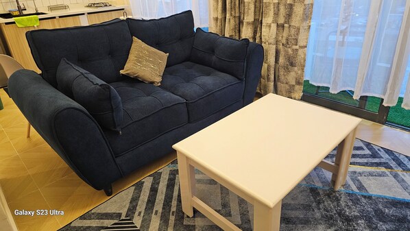 Desk, laptop workspace, blackout curtains, free WiFi