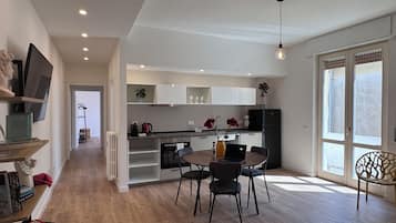 Apartment, Balcony, Courtyard View | Living area | Flat-screen TV