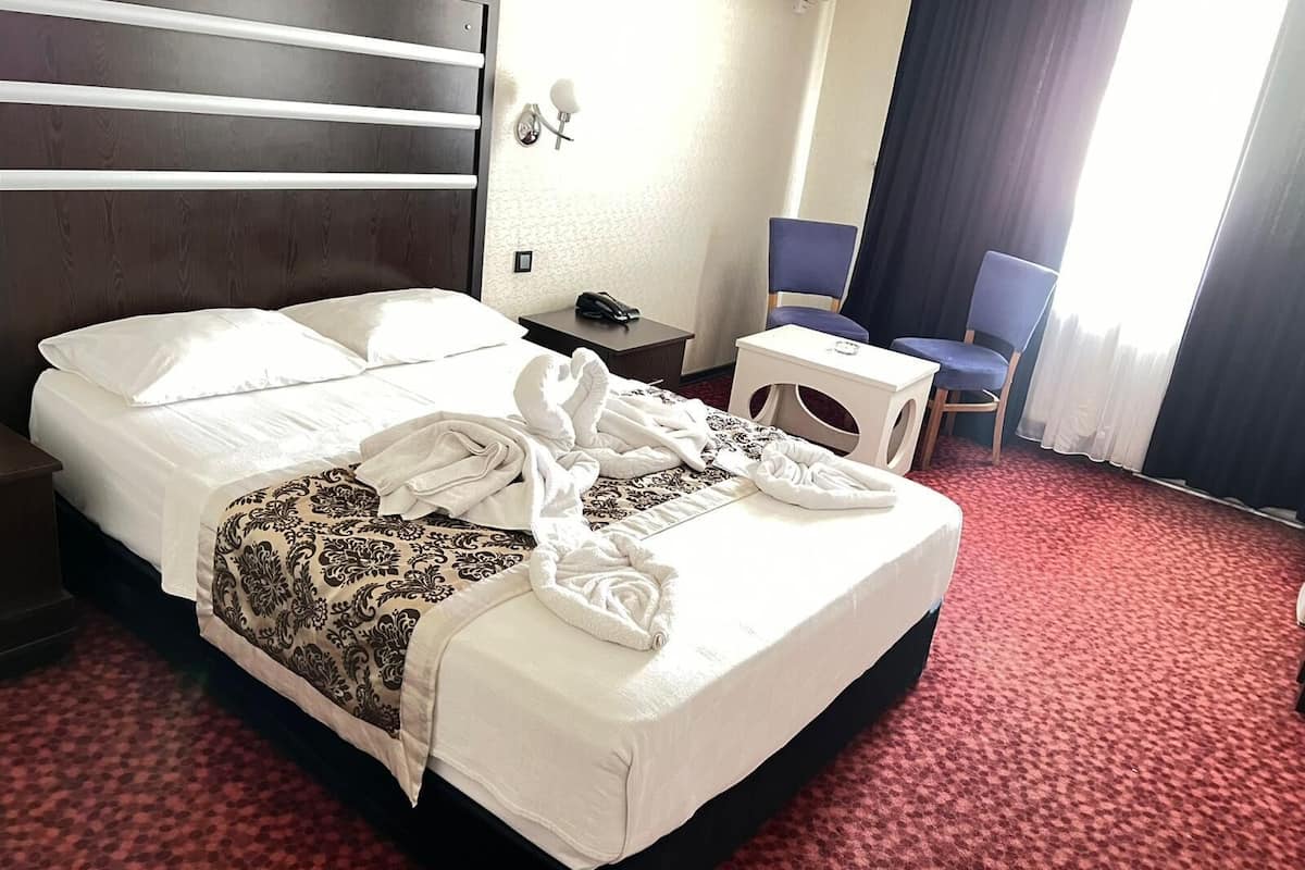 Basic Double Room, 1 Queen Bed, Partial Sea View | Desk, laptop workspace, free WiFi
