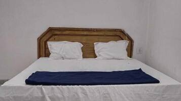 Premium bedding, desk, laptop workspace, bed sheets