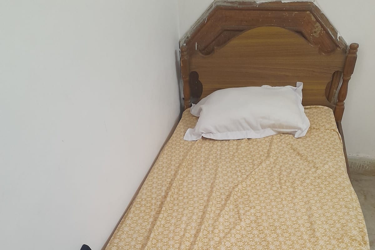 Premium bedding, desk, laptop workspace, bed sheets