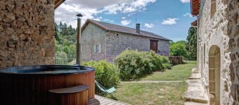 Charming retreat in Usson-en-Forez with hot tub and premium comfort