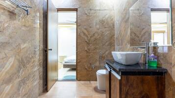 Shower, towels, soap, shampoo