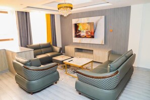 Deluxe Apartment | Living area | 32-inch Smart TV with digital channels - Aqua Resort Naivasha (Naivasha)