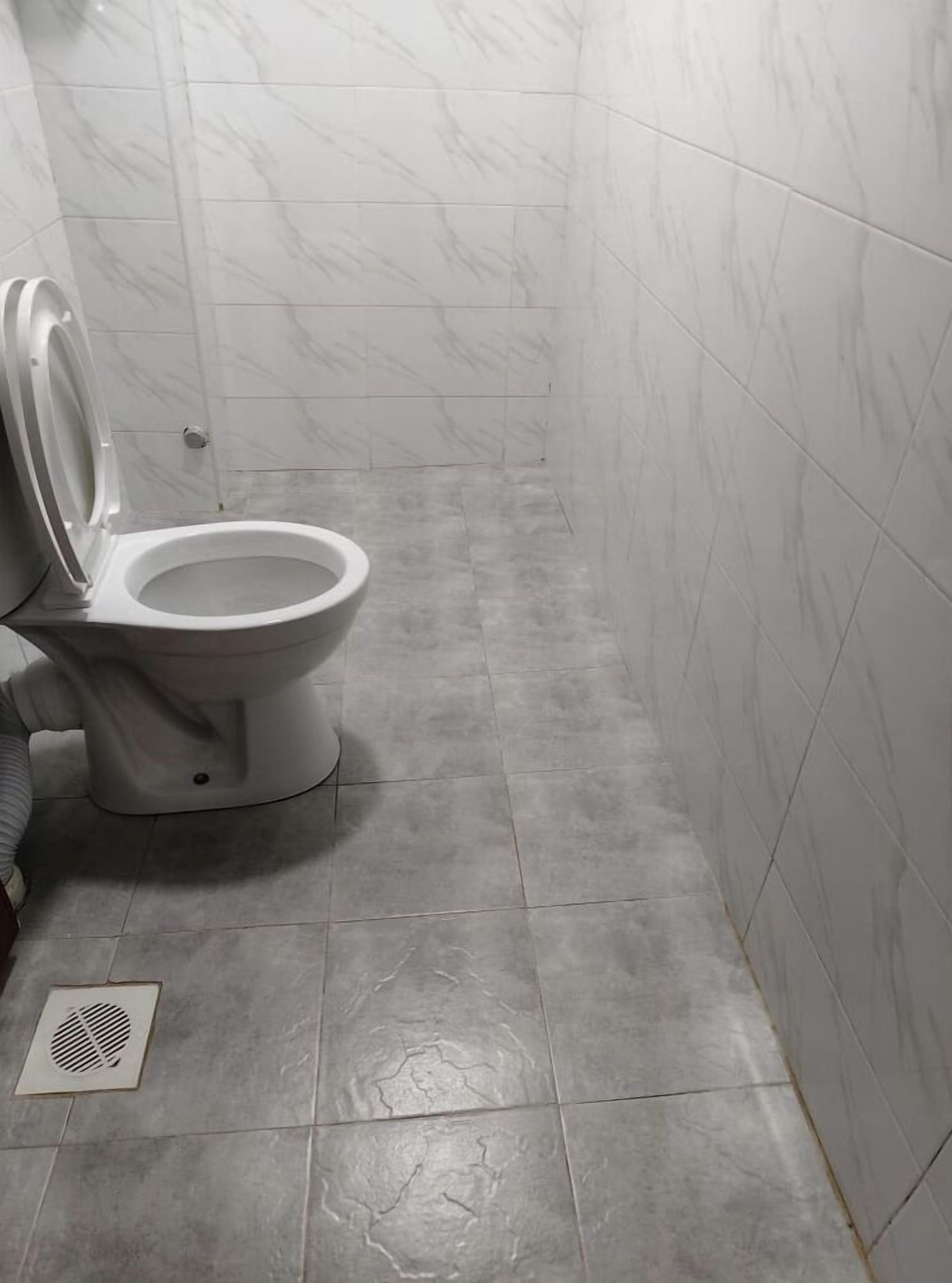 Shower, slippers, towels, soap