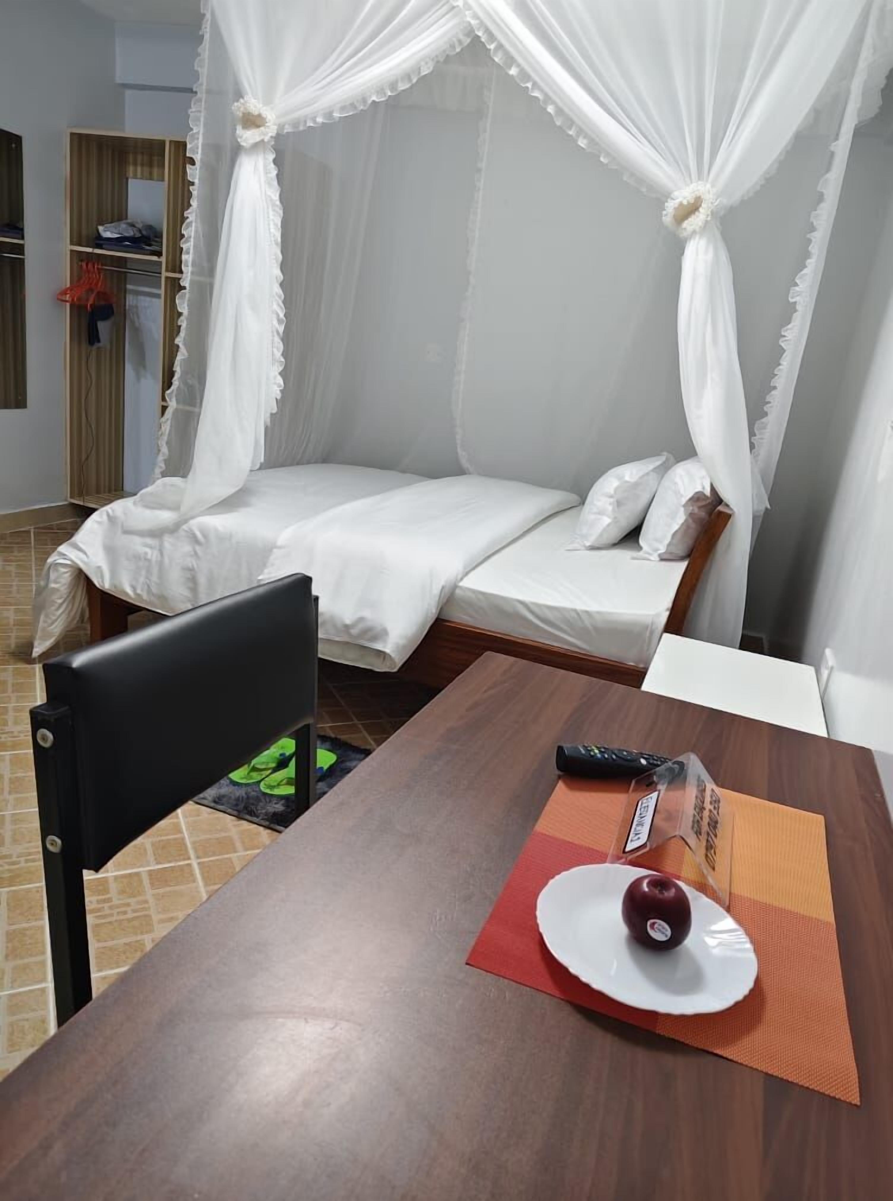 Deluxe Studio, City View | Living area | 32-inch Smart TV with digital channels