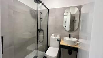 Shower, towels, soap, shampoo
