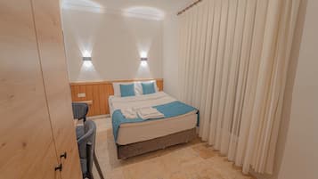 Economy Double or Twin Room | Desk, laptop workspace, free WiFi, bed sheets