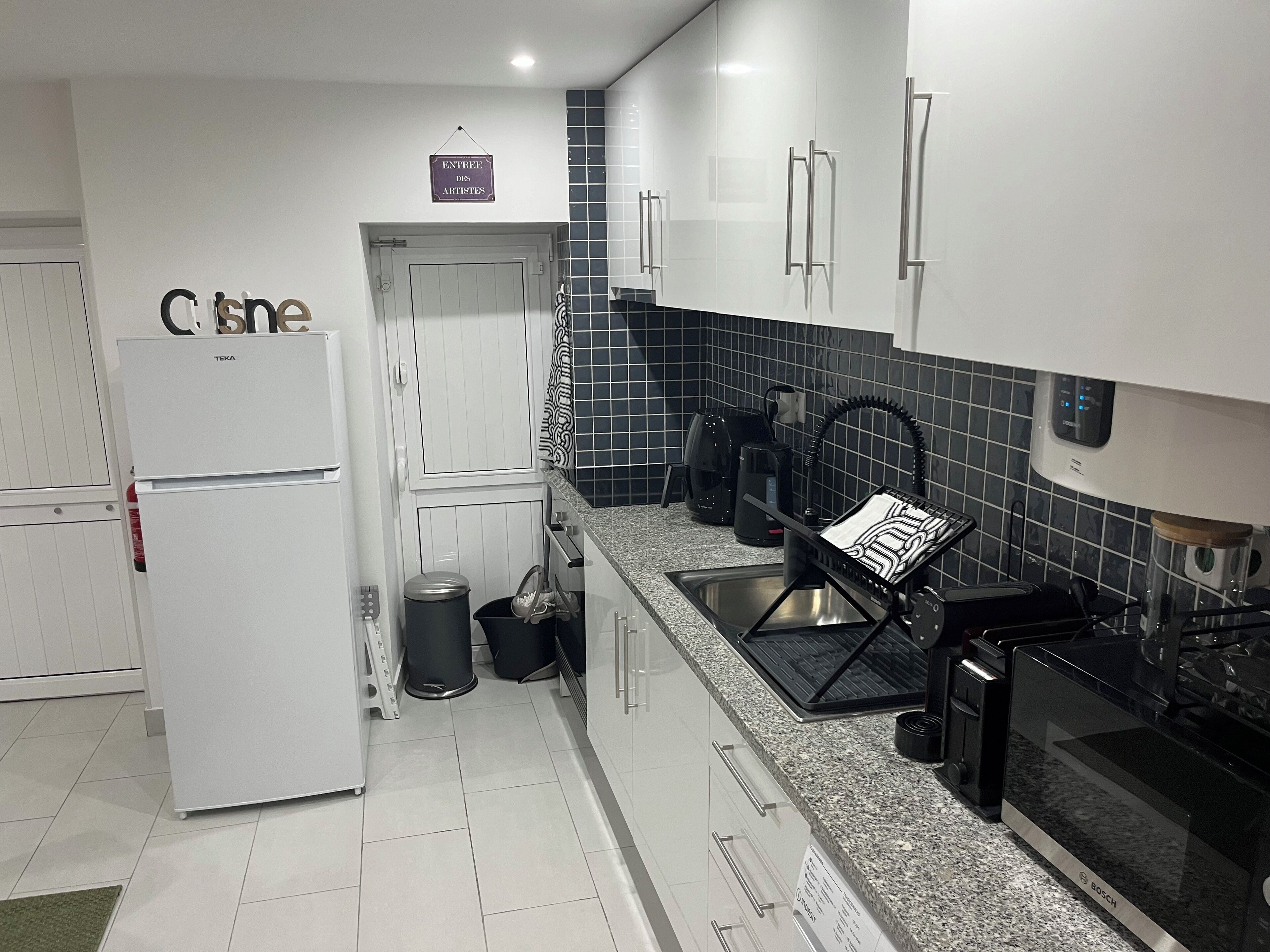 Microwave, stovetop, coffee/tea maker, electric kettle