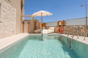 Outdoor pool, pool umbrellas, pool loungers