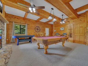 A wooden room with a pool table, ceiling fans, and a dartboard. - Cabin w/Great View|Hot Tub|Pool Table & Air Hockey (Gatlinburg)