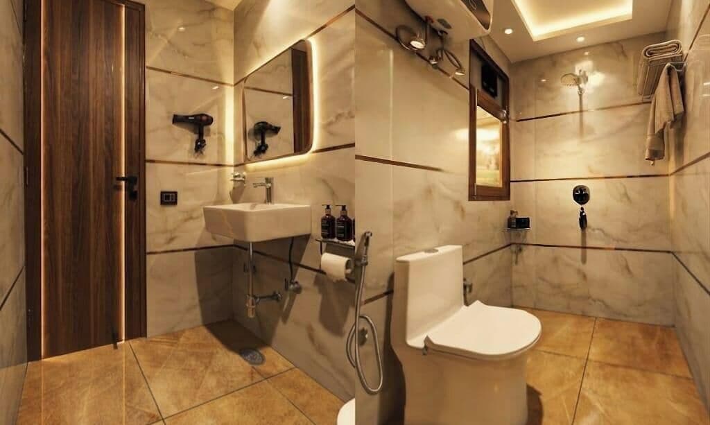 Un baño moderno con tocador, lavamanos, espejo y ducha.