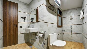 Deluxe Double Room, City View | Bathroom | Shower, free toiletries, bathrobes, slippers