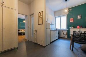 Apartment, 1 Bedroom | Living area | 30-inch TV with satellite channels