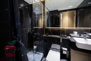 Shower, hair dryer, towels, soap