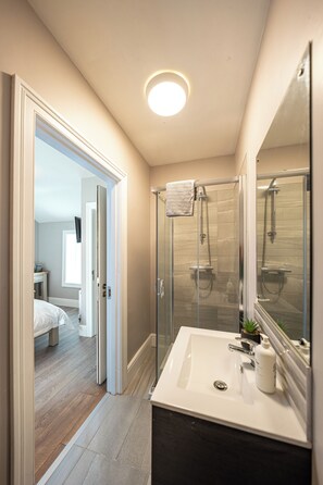 Shower, towels, soap, shampoo