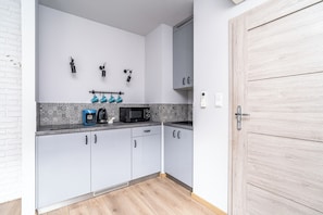 Appartement Deluxe, vue cour intérieure | Cuisine privée