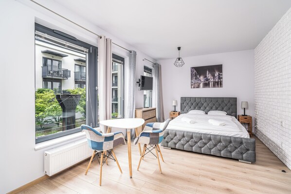 Deluxe Apartment, Courtyard View | Iron/ironing board, free WiFi