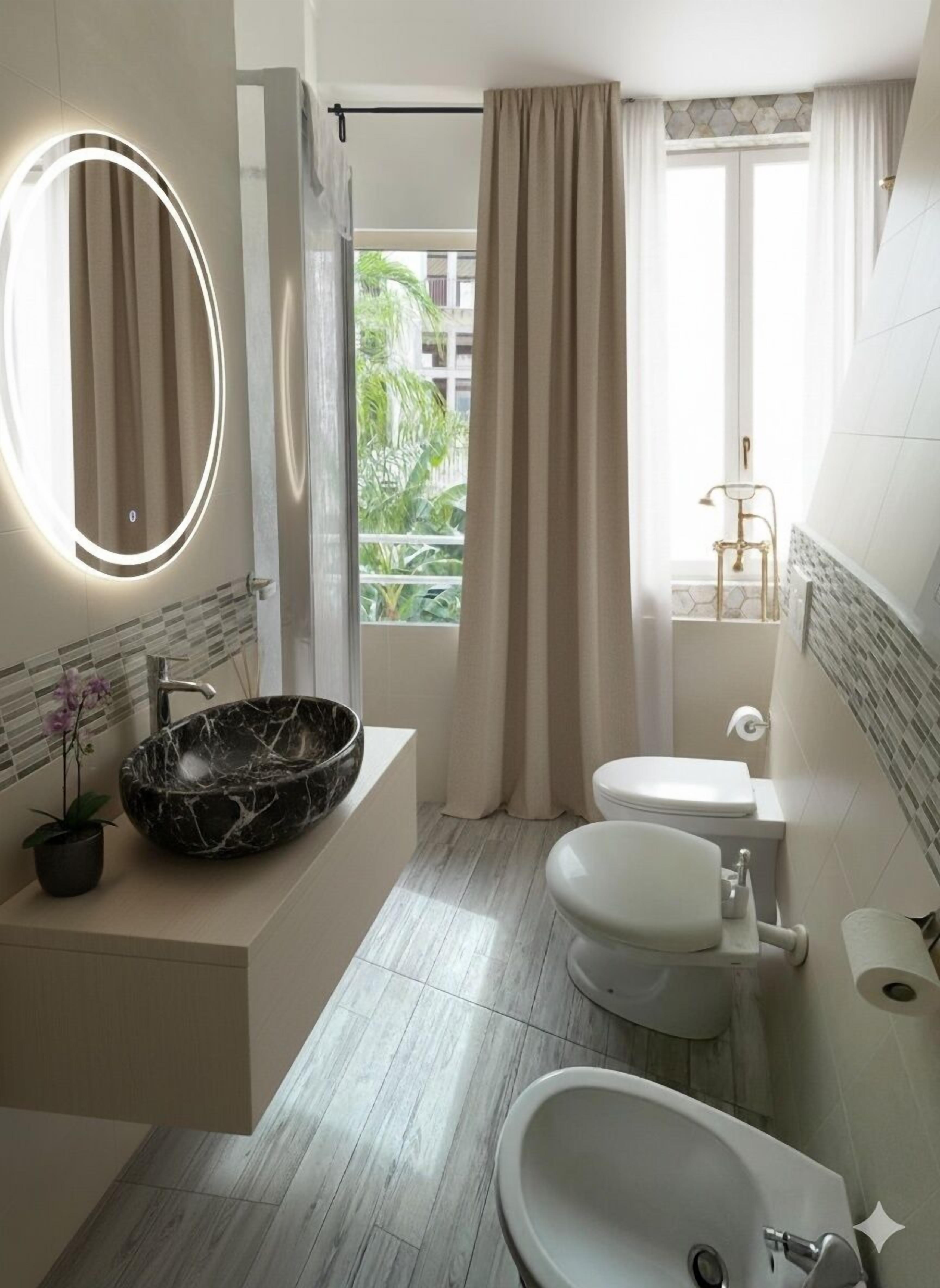 Jetted bath, rainfall showerhead, hair dryer, bidet