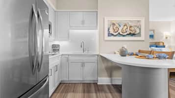 Fridge, microwave, stovetop, coffee/tea maker