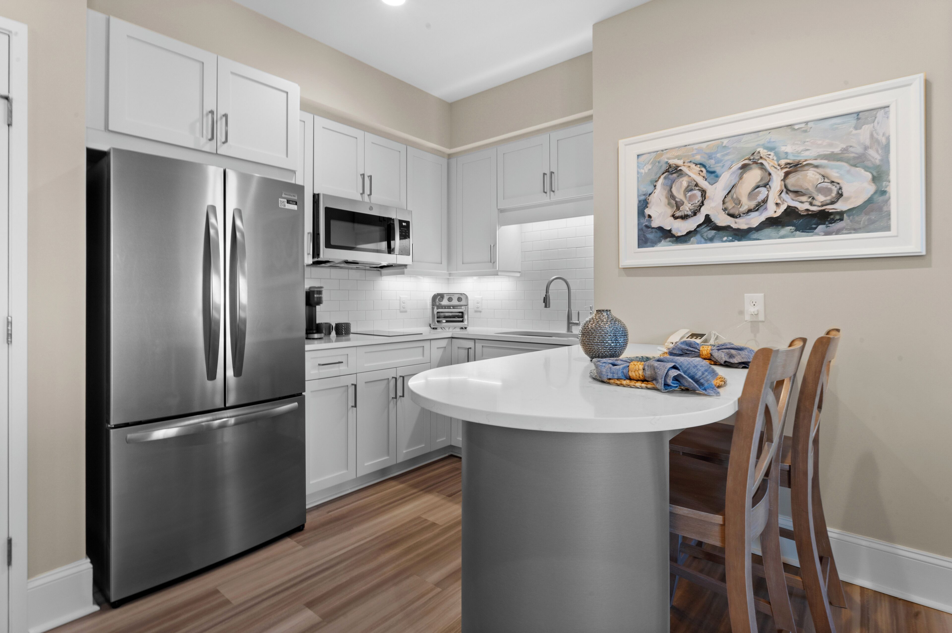 Fridge, microwave, stovetop, coffee/tea maker