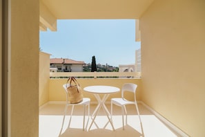 Classic Room, Balcony, City View | In-room safe, desk, iron/ironing board, free WiFi