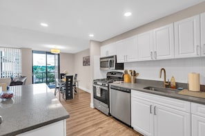 Apartment, 2 Bedrooms | Private kitchen | Fridge, oven, coffee/tea maker, toaster
