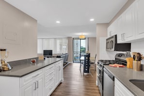 Apartment, 2 Bedrooms | Private kitchen | Fridge, oven, coffee/tea maker, toaster