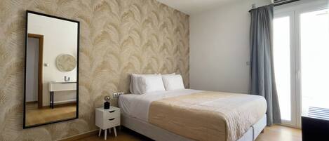 2 slaapkamers, een strijkplank/strijkijzer, gratis wifi, beddengoed