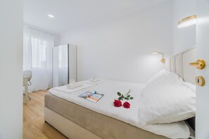 Family Apartment, 2 Bedrooms (Central Cozy 2 Bedroom Apartment) | 2 bedrooms, laptop workspace, free WiFi, bed sheets