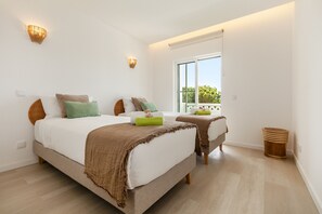 2 bedrooms, cots/infant beds, bed sheets