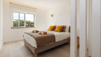 2 bedrooms, cots/infant beds, bed sheets