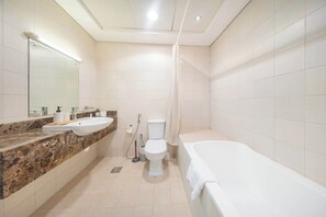 Shower, hair dryer, towels