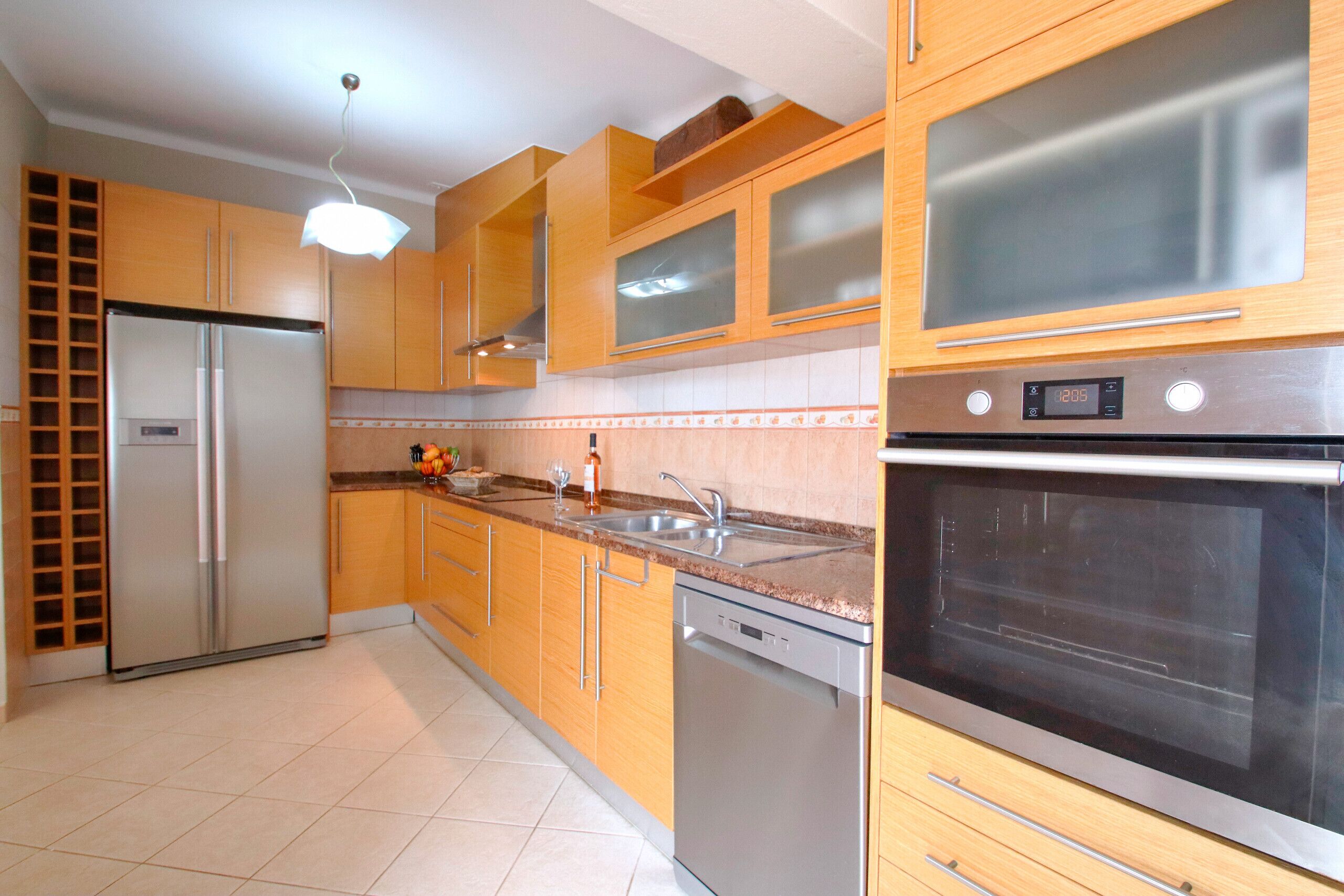 Microwave, dishwasher, coffee/tea maker, cookware/dishes/utensils