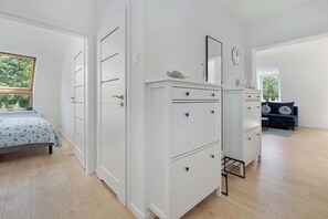 1 bedroom, desk, iron/ironing board, travel crib