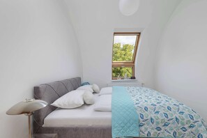 1 bedroom, desk, iron/ironing board, travel cot