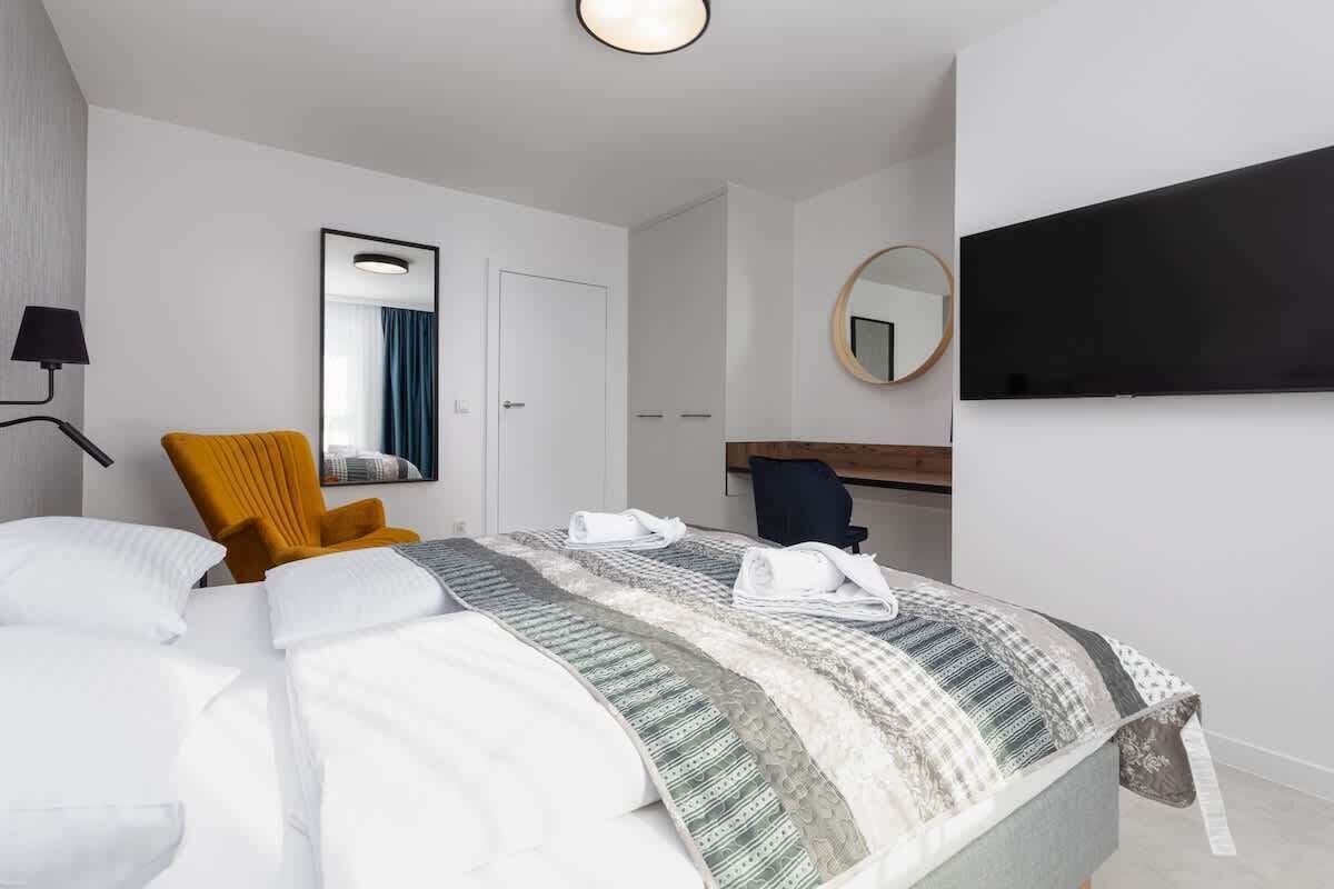 4 slaapkamers, een bureau, een strijkplank/strijkijzer, wifi