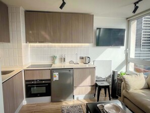 Fridge, stovetop, coffee/tea maker, toaster