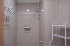 Standard Studio | Bathroom - Comfy And Minimalist Studio Apartment B Residence (Pagedangan)