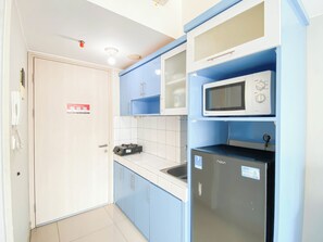 Standard Studio | Private kitchen - Restful Studio Apartment At Springlake Summarecon Bekasi (Bekasi)