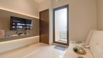 Apartamento estándar | Sala de estar