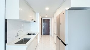 Standard Apartment | Private kitchen - Cozy 2Br With Extra Room At Sky House Bsd Apartment (Pagedangan)