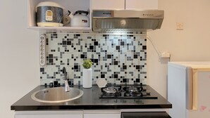 Standard Studio | Private kitchen - Warm Stay Studio At Cinere Bellevue Suites Apartment (Depok)