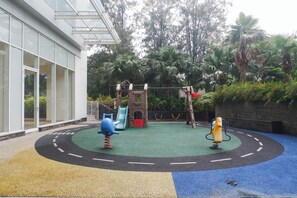Children’s play area – outdoor - Stunning And Simply 2Br At Grand Sungkono Lagoon Apartment (Surabaya)