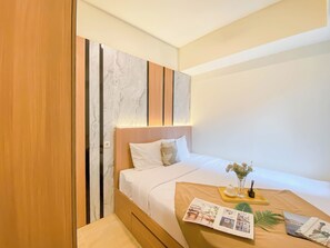Standard Apartment | Bed sheets - Homey And Modern 2Br At Meikarta Apartment (Cikarang)