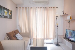 Standard Apartment | Living area - Comfy And Modern 1Br Apartment Paramount Skyline (Gading Serpong)